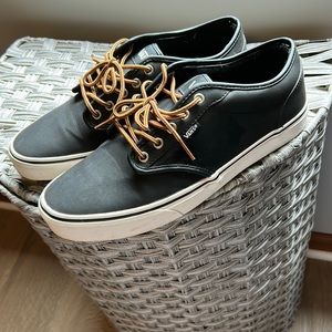 size 11 men’s VANS skater sneaker. black pleather/brown laces
